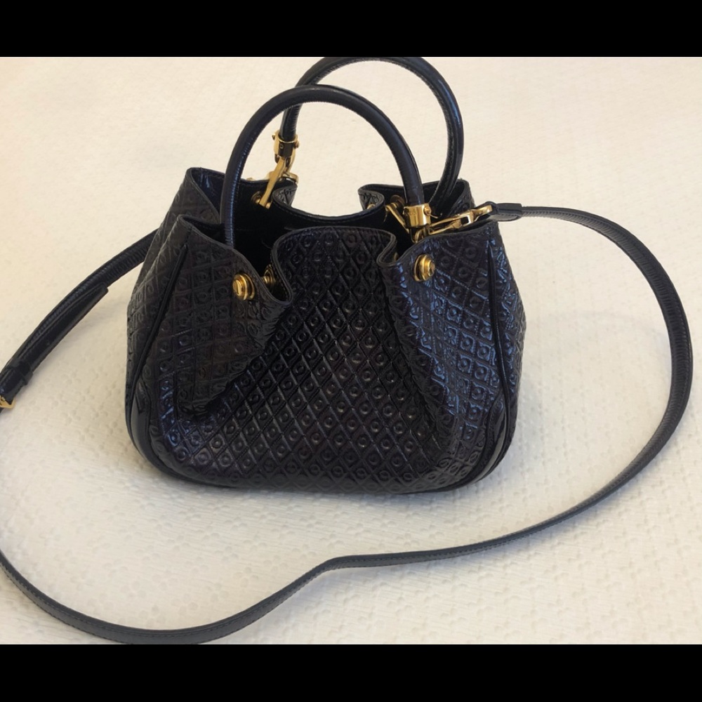 Sophisticated and unique deep purple Tod’s bag